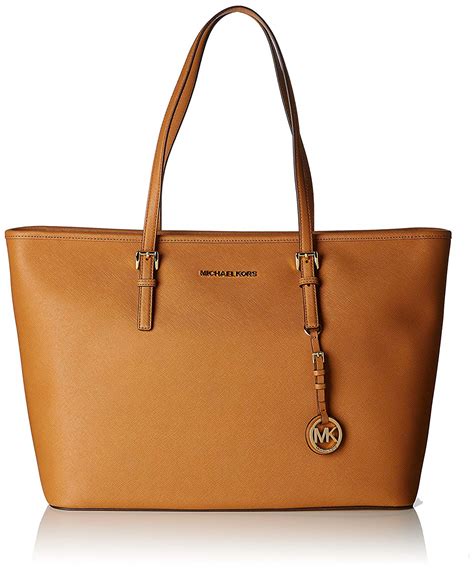 michael kors jet set top tan leather tote|Michael Kors large travel bag.